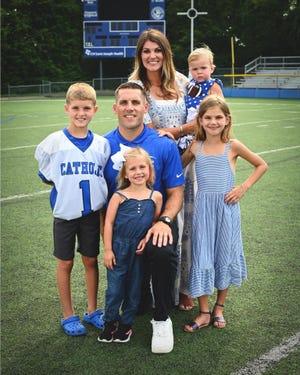 Highlands graduate Bert Bathiany with family at Lexington Catholic, 2022 picture.