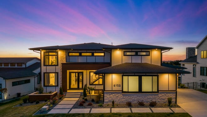 A $1.5 million modern home in Ankeny features 6 bedrooms, heated pool