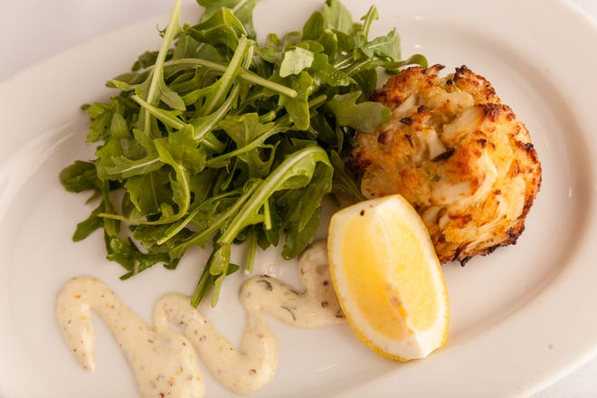 The Company Crab Cake entrée by Rick Erwin's Dining Group