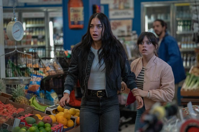 Sam (Melissa Barrera, left) and Tara (Jenna Ortega) run into Ghostface at the local bodega in "Scream VI."