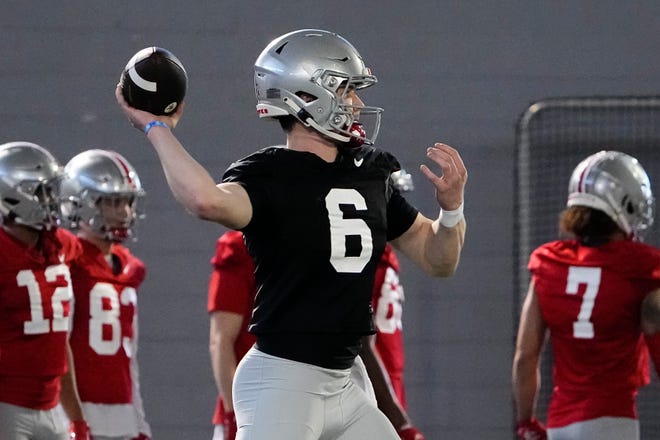 Mar 7, 2023; Columbus, Ohio, USA;  Ohio State Buckeyes quarterback Kyle McCord (6) throws during spring football drills at the Woody Hayes Athletic Center. Mandatory Credit: Adam Cairns-The Columbus Dispatch