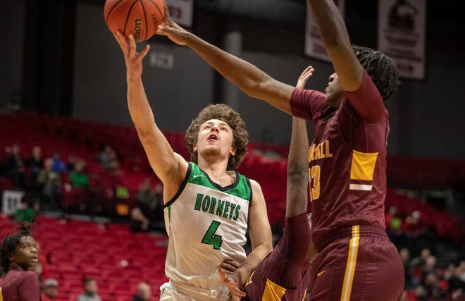 Scales Mound's Jacob Duerr goes up against Chicago Marshall on Monday, March 6, 2023, at Northern Illinois University in DeKalb.