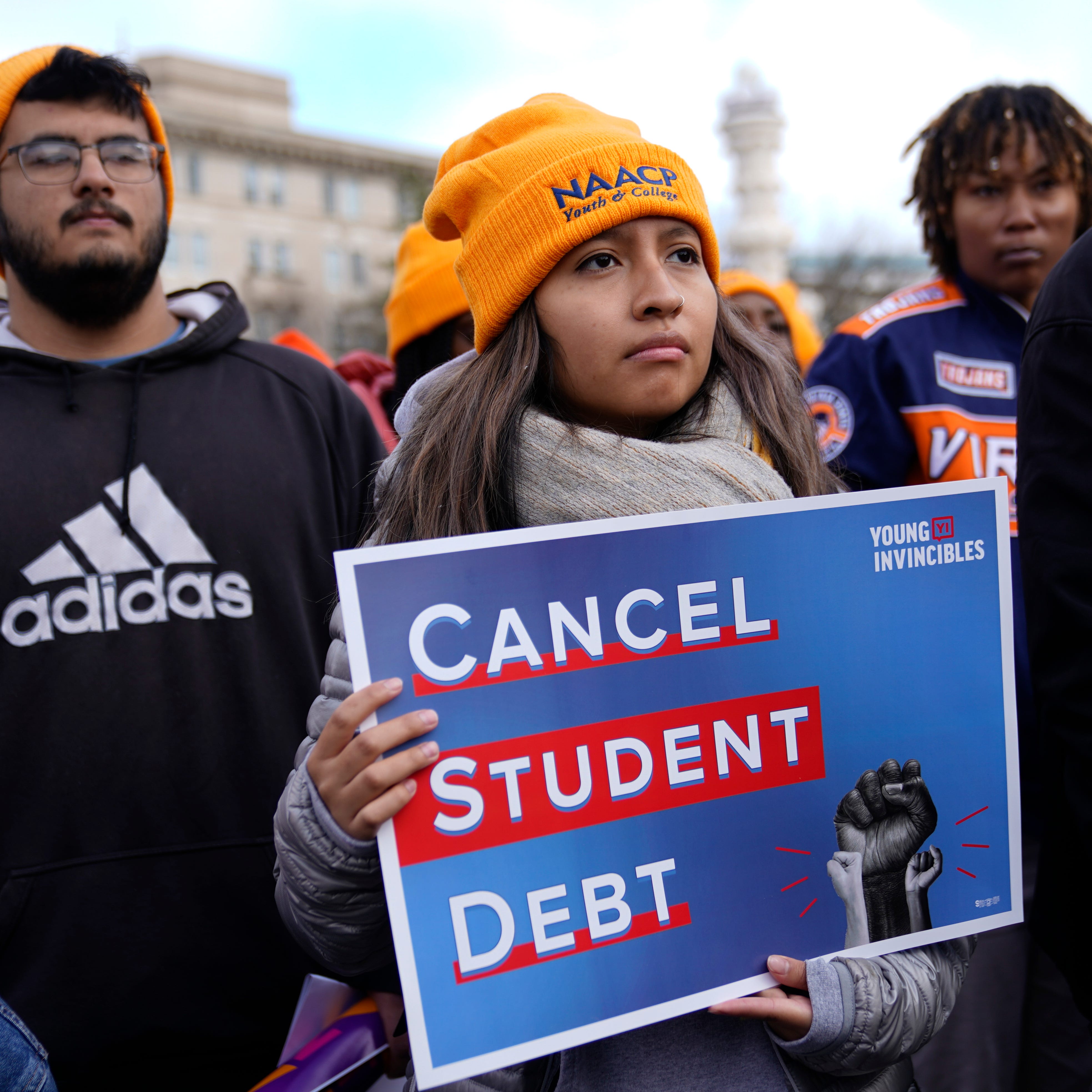 Student debt relief advocates gather outside the Supreme Court on Capitol Hill in Washington, Tuesday, Feb. 28, 2023.