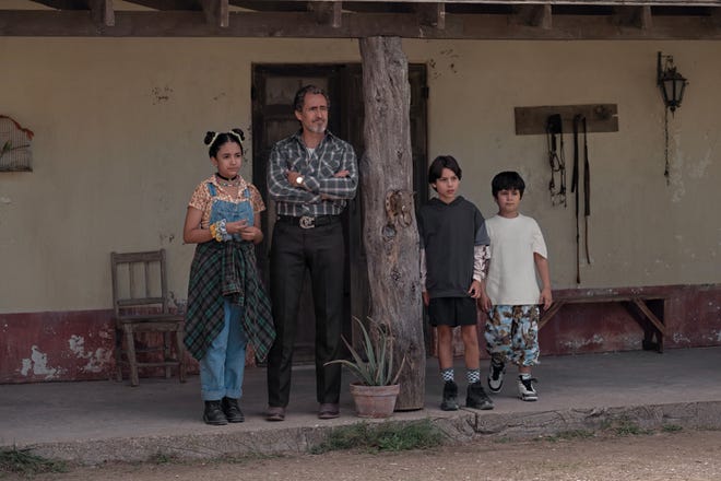 Ashley Ciarra (from left) as Luna, Demián Bichir as Chava, Evan Whitten as Alex, and Nickolas Verdugo as Memo in Netflix's "Chupa."