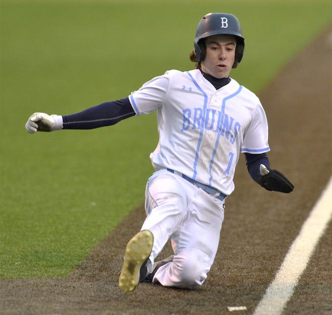 Bartlesville High's Zeb Henry powers into third base during baseball action March 2, 2023, at Rigdon Field.