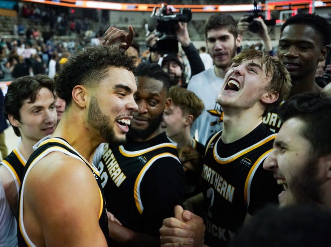 Mar 7, 2023; Indianapolis, IN, USA;  Northern Kentucky Norse guard Trey Robinson (1) celebrates with his teammates after defeating the Cleveland State Vikings to win the Horizon League Championship at Indiana Farmers Coliseum.