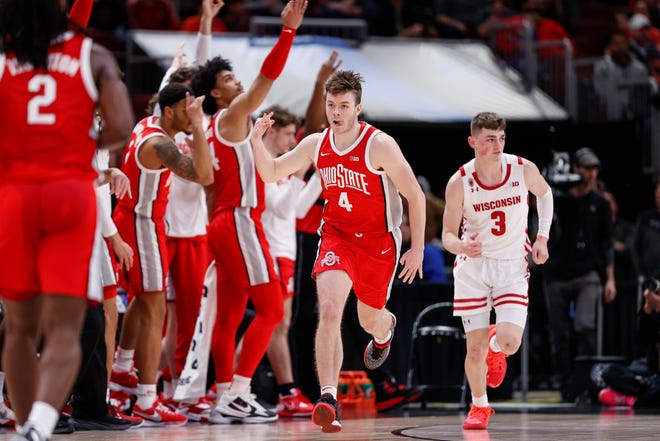 Mar 8, 2023; Chicago, IL, USA; Ohio State Buckeyes guard Sean McNeil (4) celebrates after scoring against the Wisconsin Badgers during the second half at United Center. Mandatory Credit: Kamil Krzaczynski-USA TODAY Sports