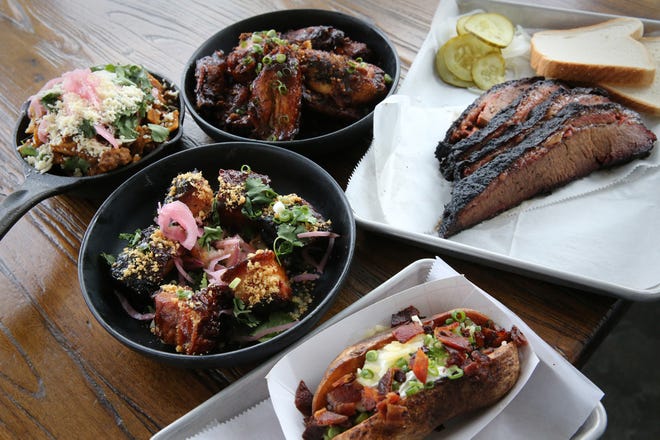 Chef Will Myska, a co-owner of Ore Nell's Barbecue in Kittery, Maine, cooked Frito pie, root beer sriracha barbecue wings, smoked Korean pork belly bites, loaded deep fried baked potato and brisket.