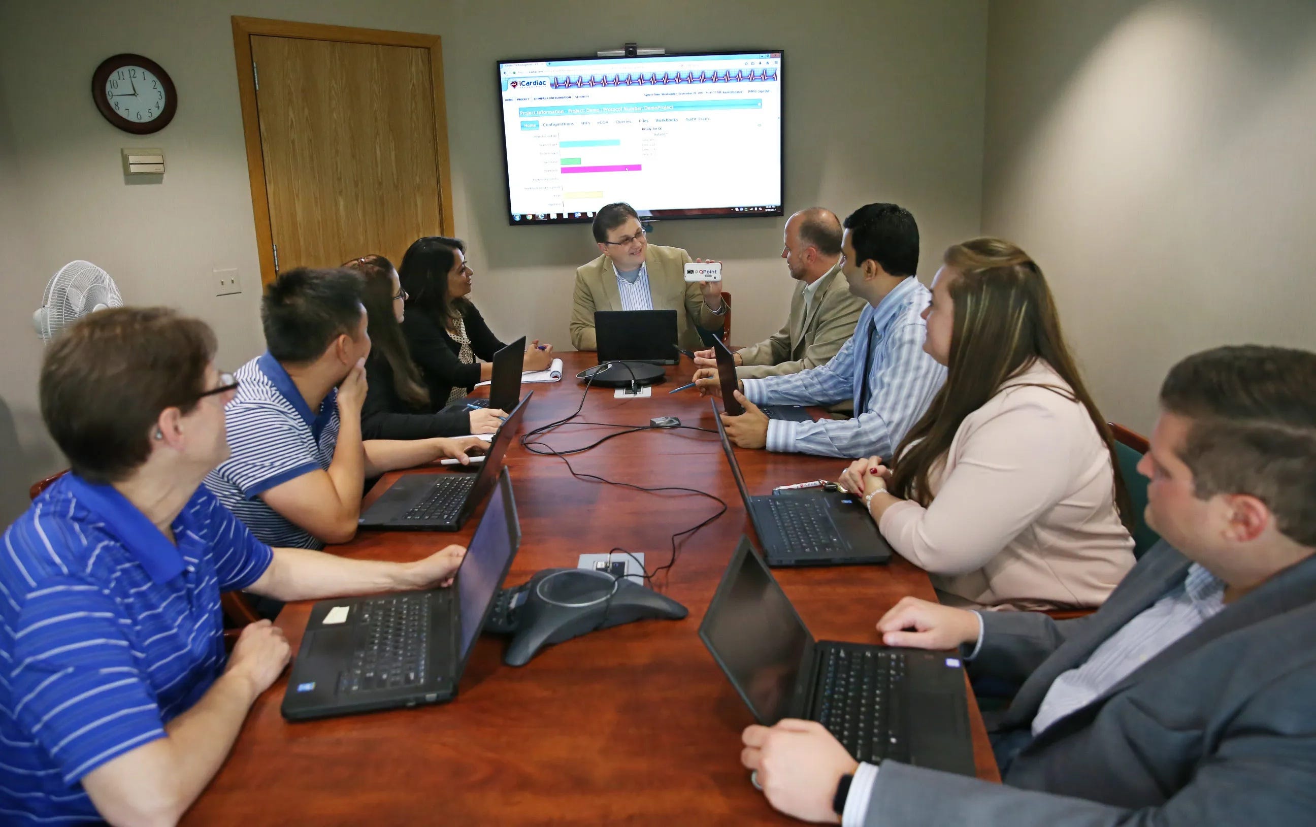 President and CEO Alex Zapesochny, top center, meets with his team at iCardiac Technologies. From left are, Jay Baker, chief financial officer; Thuan Pham, director of software development; Charcy Schultz, director of quality and regulatory compliance; Smriti Jacob, senior manager, marketing and communications; Zapesochny; Brian Smith, vice president of project operations; Kamlesh Naidu, director of data management; Kristy Ioele, human resources manager; and Dave Mullaney, director of information technology.