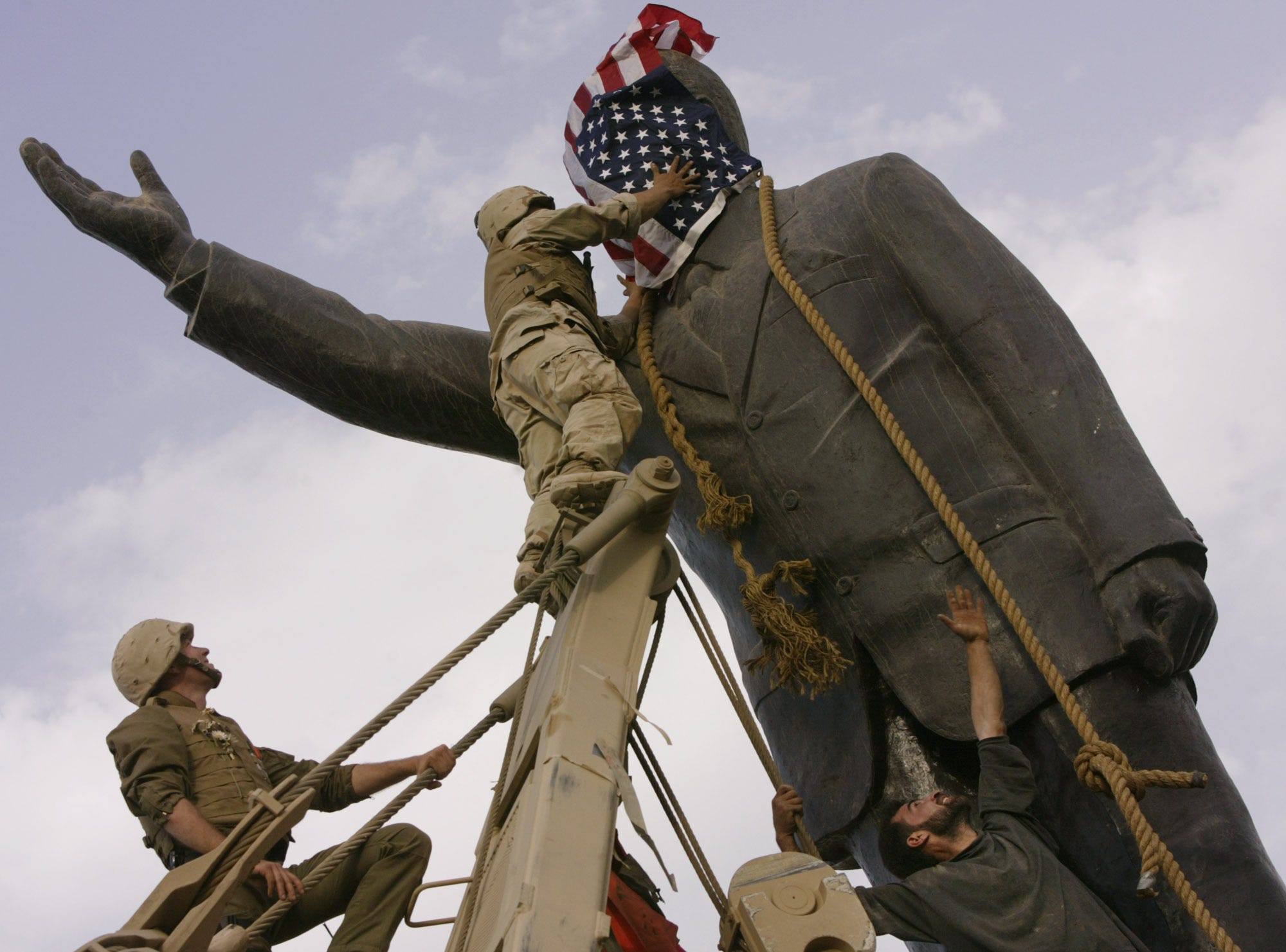 On the 20th anniversary of the U.S. invasion of Iraq, these photos tell the story of the war