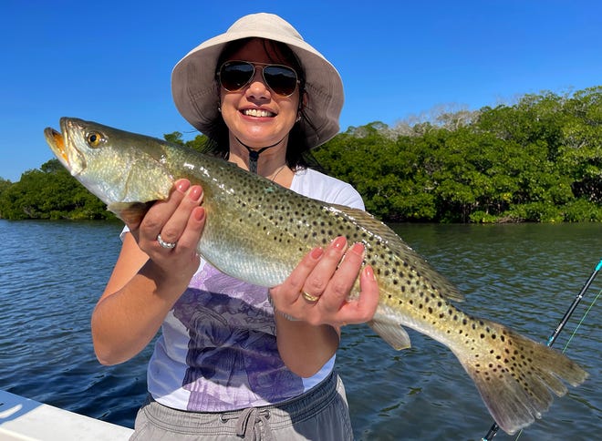 Andressa Pereira, of S‹o Paulo, Brazil caught this big 25-inch speckled trout on a live scaled sardine while fishing in Terra Ceia Bay with Capt. John Gunter this week.