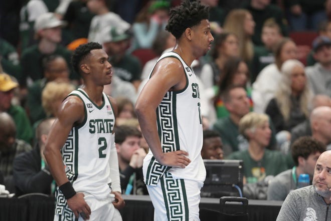 Michigan State Spartans guards Tyson Walker (2) and  A.J. Hoggard (11) look on from the bench during the 68-58 loss to the Ohio State Buckeyes in the Big Ten tournament quarterfinals at United Center in Chicago on Friday, March 10, 2023.