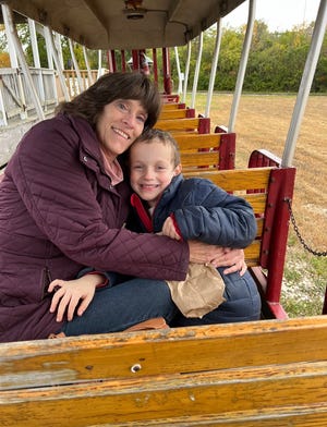 Stacy Barkley, of Deerfield, Illinois, smiles in one of her favorite photos with her grandson, Luke.