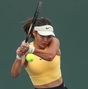 Emma Raducanu hits a shot during her win over Magda Linnette at the BNP Paribas Open in Indian Wells, Calif., March 11, 2023. 