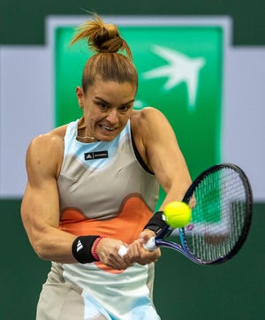 Maria Sakkari of Greece returns to Shelby Rogers of the United States during their second-round match of the BNP Paribas Open at the Indian Wells Tennis Garden in Indian Wells, Calif., Friday, March 10, 2023. 