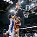 Texas men stun Kansas to win Big 12 basketball title, make its claim for a No. 2 seed