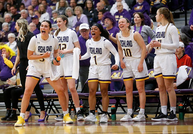 The University of Ashland bench celebrates after firing a shot against Treveka Nazarene during the NCAA Midwest Regional Semifinals, Saturday, March 11, 2023 at Kates Gymnasium.
