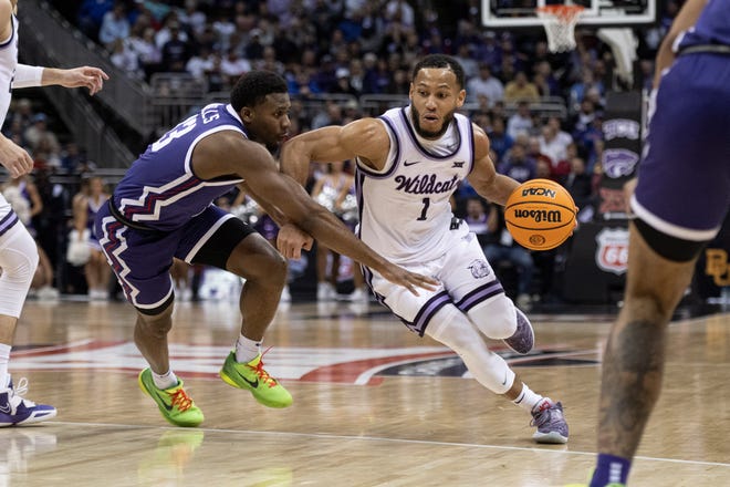 Kansas State guard Markquis Nowell (1) drives the ball against TCU's Shahada Wells (13) on Thursday during a Big 12 Tournament quarterfinal game at T-Mobile Center. Nowell and the Wildcats will face Montana State in the first round of the NCAA Tournament on Friday in Greensboro, N.C.
