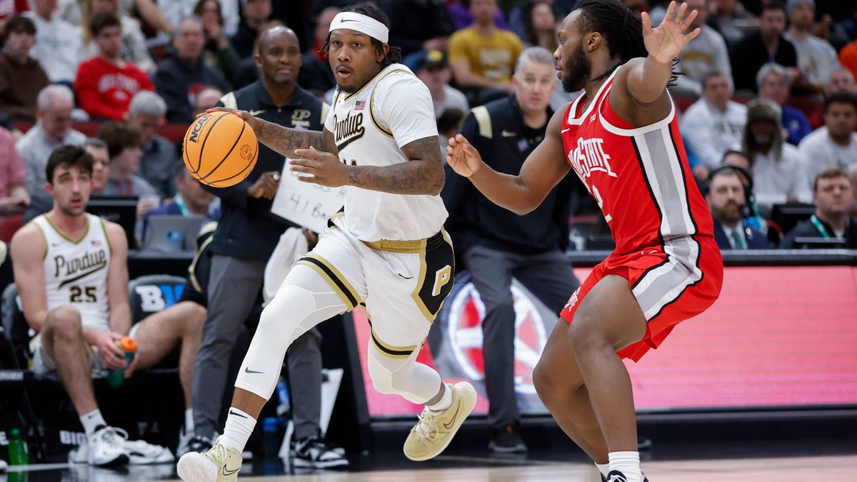 Purdue guard David Jenkins Jr. (14) drives to the basket against Ohio State guard Bruce Thornton (2) during the second half of their Big Ten tournament game at United Center.
