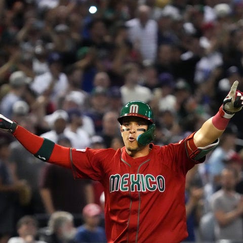 Mexico's Joey Meneses celebrates his 2-run home ru