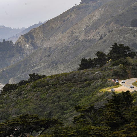 Cars drive south on Highway 1 near Big Sur, Calif.
