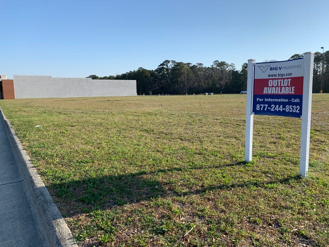The site of a proposed nearly 150,000-square-foot retail building in a shopping center located near the intersection of Carolina Beach and S. College Roads.