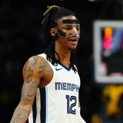 Ja Morant reacts during a game against the Nuggets