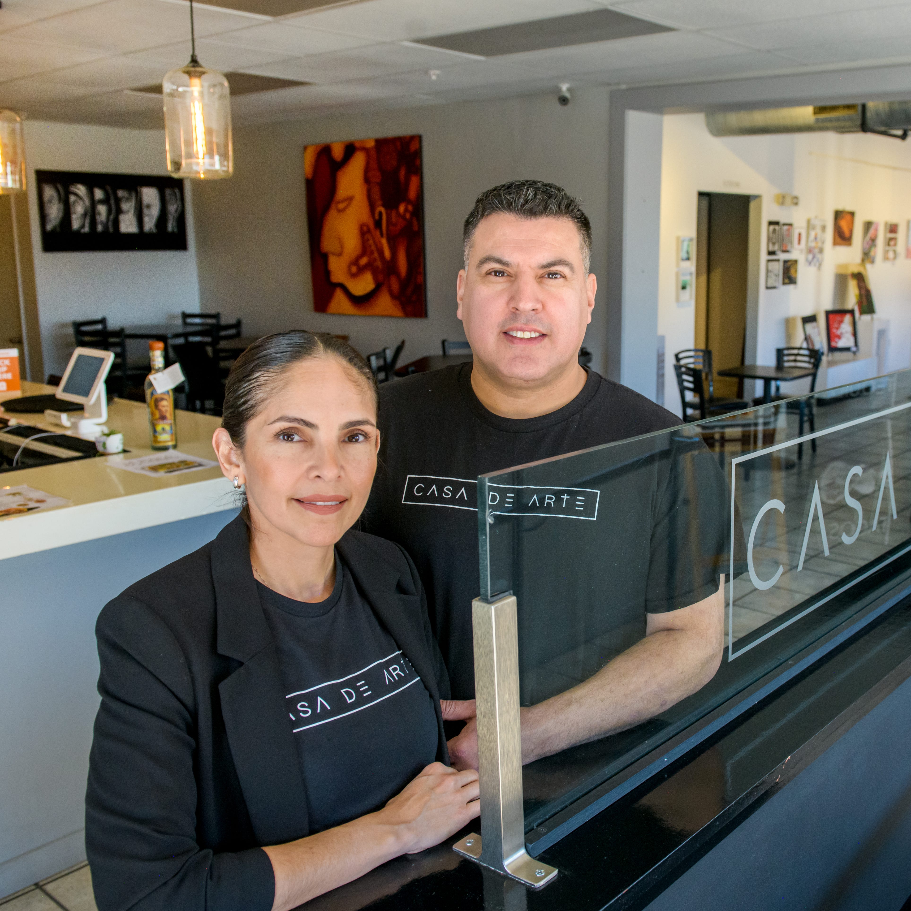 Carla Zamora-Vargas, left, and her husband Arturo Vargas are the co-owners of Casa De Arte, or "House of Art," a Mexican restaurant and bar that also serves as a gallery space for local artists. The couple opened the business in November of 2018 after purchasing the old building at 1227 SW Adams Street in Peoria's Warehouse District.