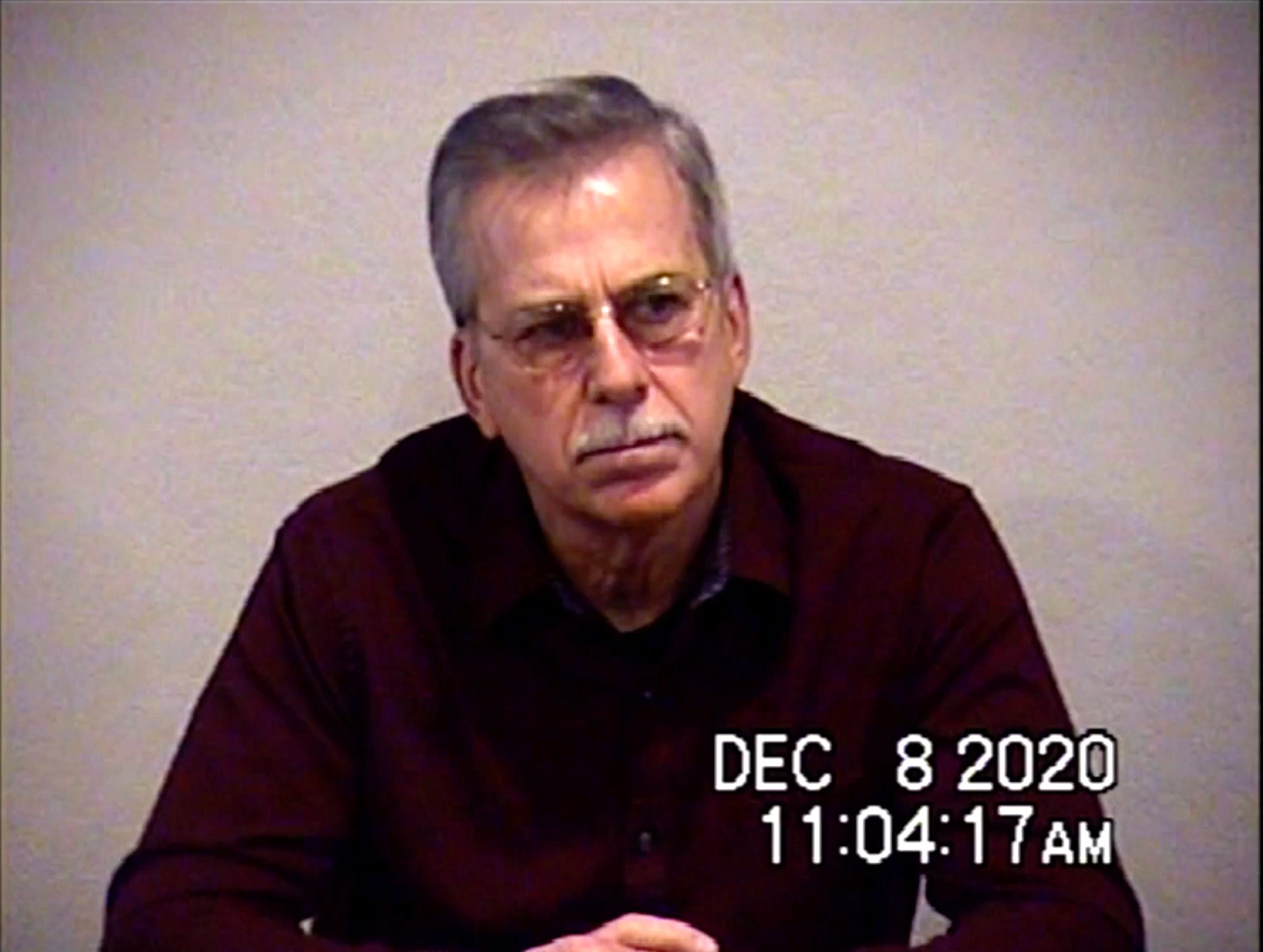 Steven Calkins answers questions related to the disappearances of Terrance Williams and Felipe Santos during a court deposition on Dec. 8, 2020.