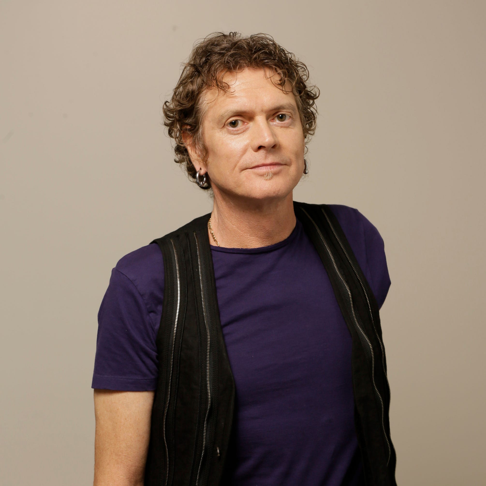 Def Leppard drummer Rick Allen poses for a photo in Los Angeles in 2013.