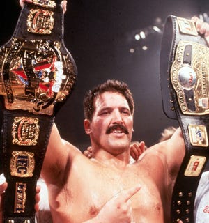 Dan Severn poses for a photo with his UFC 5 tournament championship belt at UFC 6 on July 14, 1995 in Casper, Wyoming.