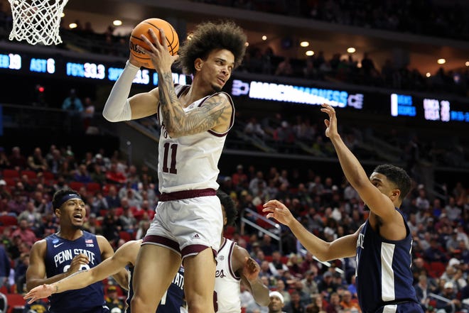 Mar 16, 2023; Des Moines, IA, USA; Texas A&M Aggies forward Andersson Garcia (11) grabs the ball against the Penn State Nittany Lions during the first half at Wells Fargo Arena. Mandatory Credit: Reese Strickland-USA TODAY Sports