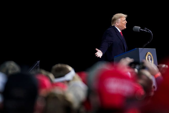 Laporan yang ditugaskan oleh Trump melemahkan klaimnya tentang pemilih yang mati dan ganda