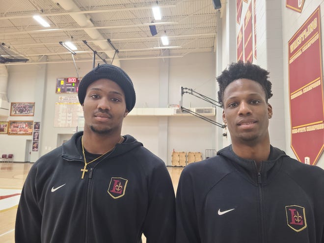 Lutheran basketball players Kam (left) and K.J. Patterson.