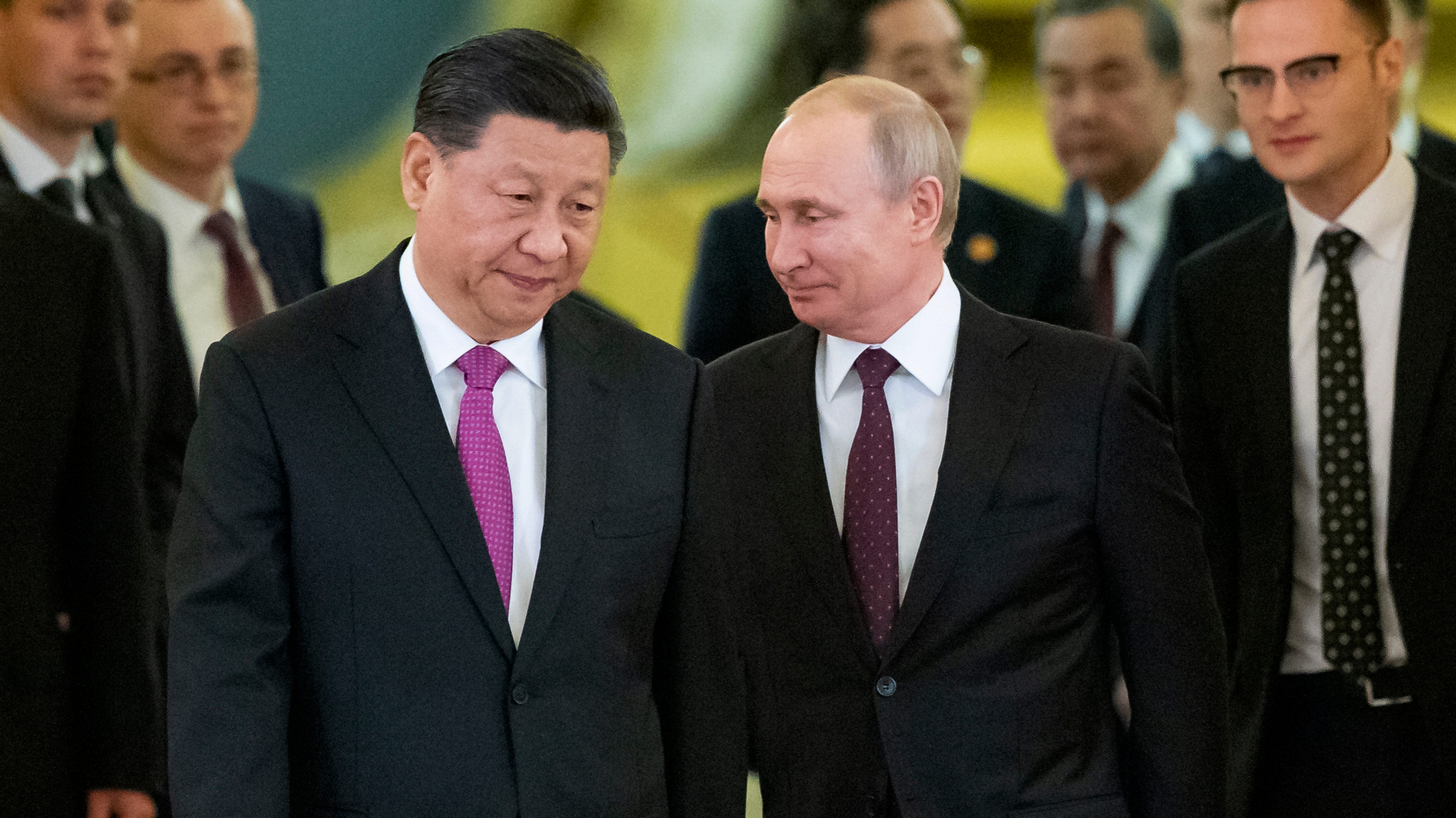 Chinese President Xi Jinping, left, and Russian President Vladimir Putin enter a hall for talks in the Kremlin in Moscow, Russia, June 5, 2019.