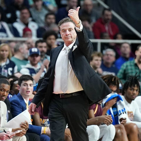 Iona coach Rick Pitino instructs his team against 