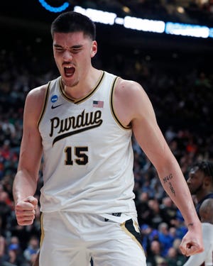 Purdue Boilermakers center Zach Edey (15) celebrates after scoring during the NCAA MenÕs Basketball Tournament game against the Fairleigh Dickinson Knights, Friday, March 17, 2023, at Nationwide Arena in Columbus, Ohio. Fairleigh Dickinson Knights won 63-58.