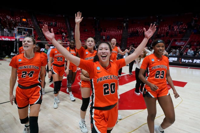Princeton players celebrate their victory over North Carolina State in the first round game.
