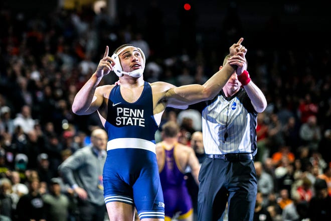 Penn State's Aaron Brooks reacts after defeating Northern Iowa's Parker Keckeisen 7-2 for the 184-pound title at the NCAA Division I Wrestling Championships in Tulsa, Okla.