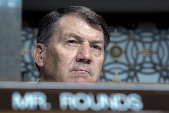 Sen. Mike Rounds, R-S.D., listens during a Senate committee hearing on Senate Armed Services hearing to examine the posture of United States Central Command and United States Africa Command in review of the Defense Authorization Request for Fiscal Year 2024 and the Future Years, Thursday, March 16, 2023, on Capitol Hill in Washington.