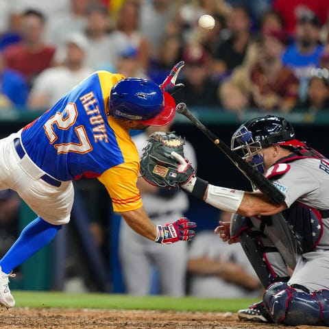 Jose Altuve is hit by a pitch by Daniel Bard durin