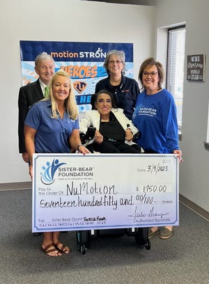 The Sister-Bear Foundation has awarded $3,849 in its first quarter 2023 grants to three recipients: David Flores, Brittan Carrier and Theresa Rowe for specialty assistance items not covered by insurance. Theresa Rowe, center, received $1,750 to purchase a wheelchair seat elevator as well as a tray and swing-away joystick.