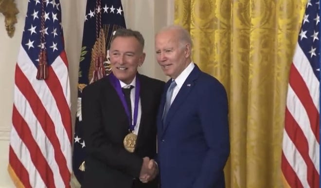 Bruce Springsteen and President Joe Biden during the National Medal of Arts and National Humanities Medal ceremony on Tuesday, March 21, in the East Room of the White House.