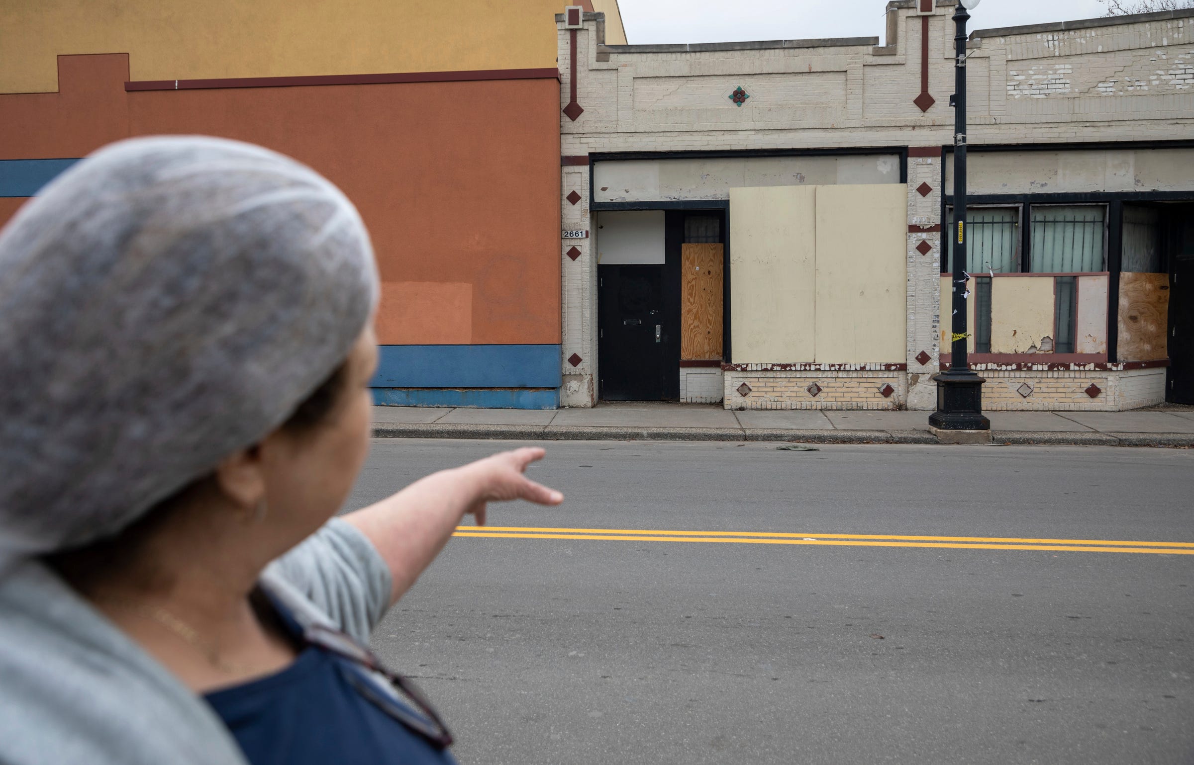 Tamaleria Nuevo Leon owner Susana "Suzy" Villarreal-Garza points at the old building on Bagley Street where Tamaleria Nuevo Leon was before they moved to its current location at 2669 Vernon Hwy., as she walks during early morning on Thursday, March 2, 2023.