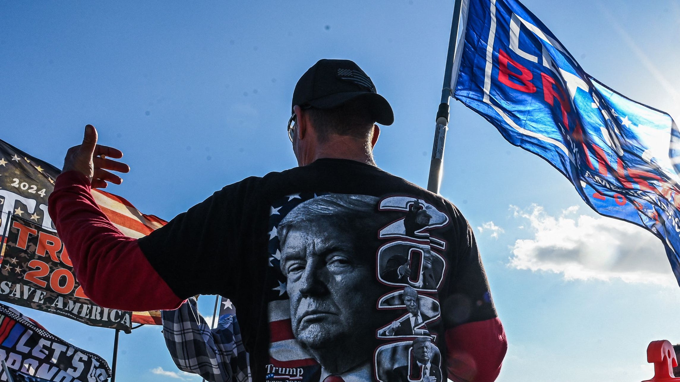 Supporters of former President Donald Trump protest near his Mar-a-Lago estate in Palm Beach, Fla., on March 21, 2023.
