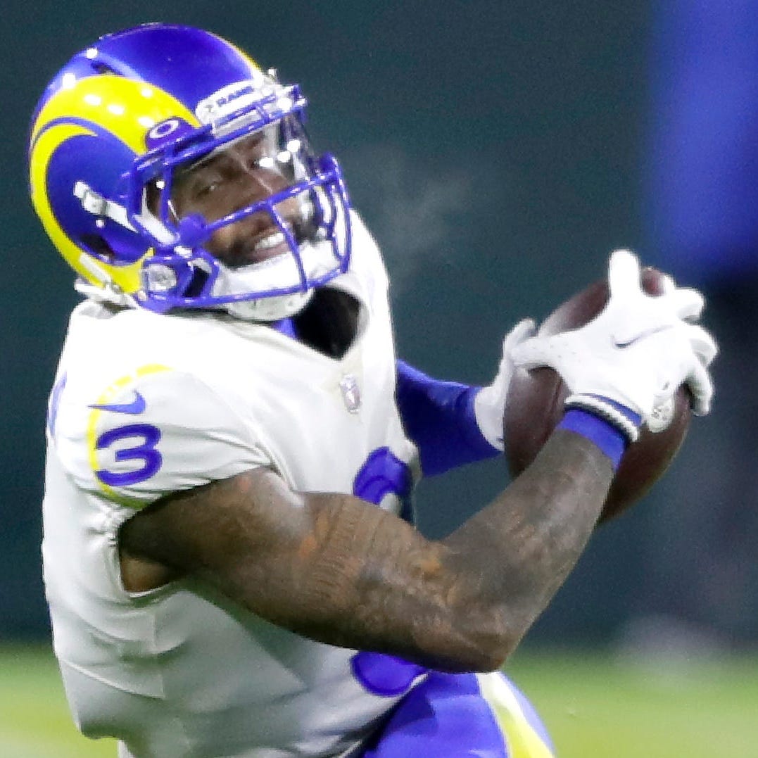 Los Angeles Rams wide receiver Odell Beckham Jr. is brought down by Green Bay Packers cornerback Eric Stokes (21) during their football game on Sunday November 28, 2021, at Lambeau Field in Green Bay, Wis.