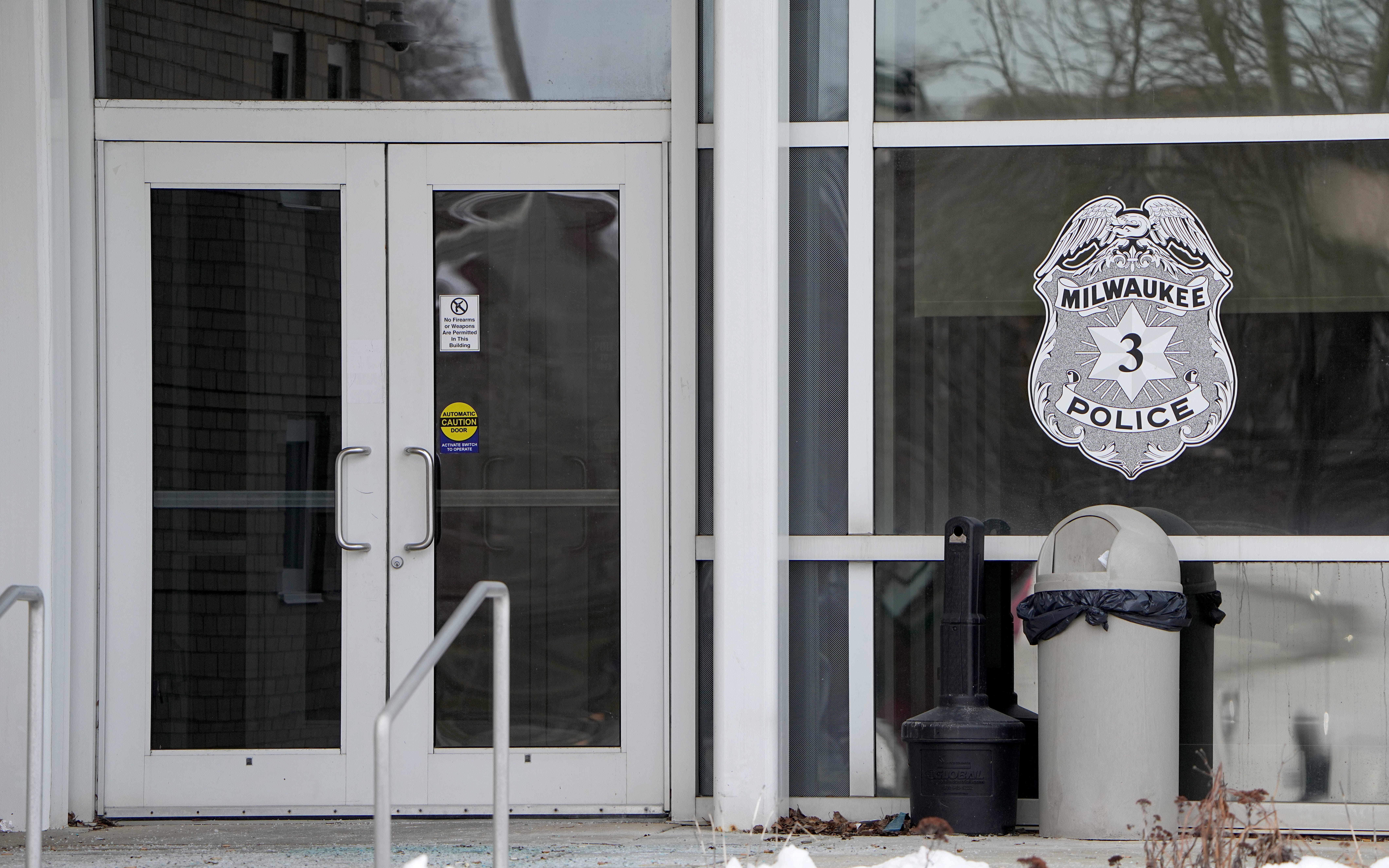 An entrance to the Milwaukee Police District 3 building is shown in Milwaukee, Wis. Bobbie Lou Schoeffling, 31, was found shot to death inside her home two weeks after telling a Milwaukee police officer on July 15 that her ex-boyfriend beat her in a car in front of her children about 30 minutes earlier.
