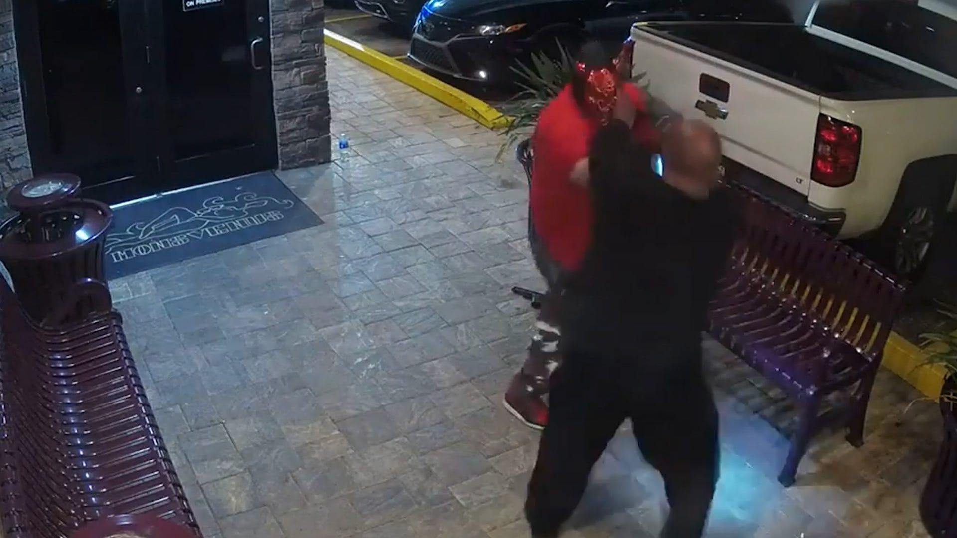 Strip club bouncers in Florida tackle masked man entering bar with gun in hand