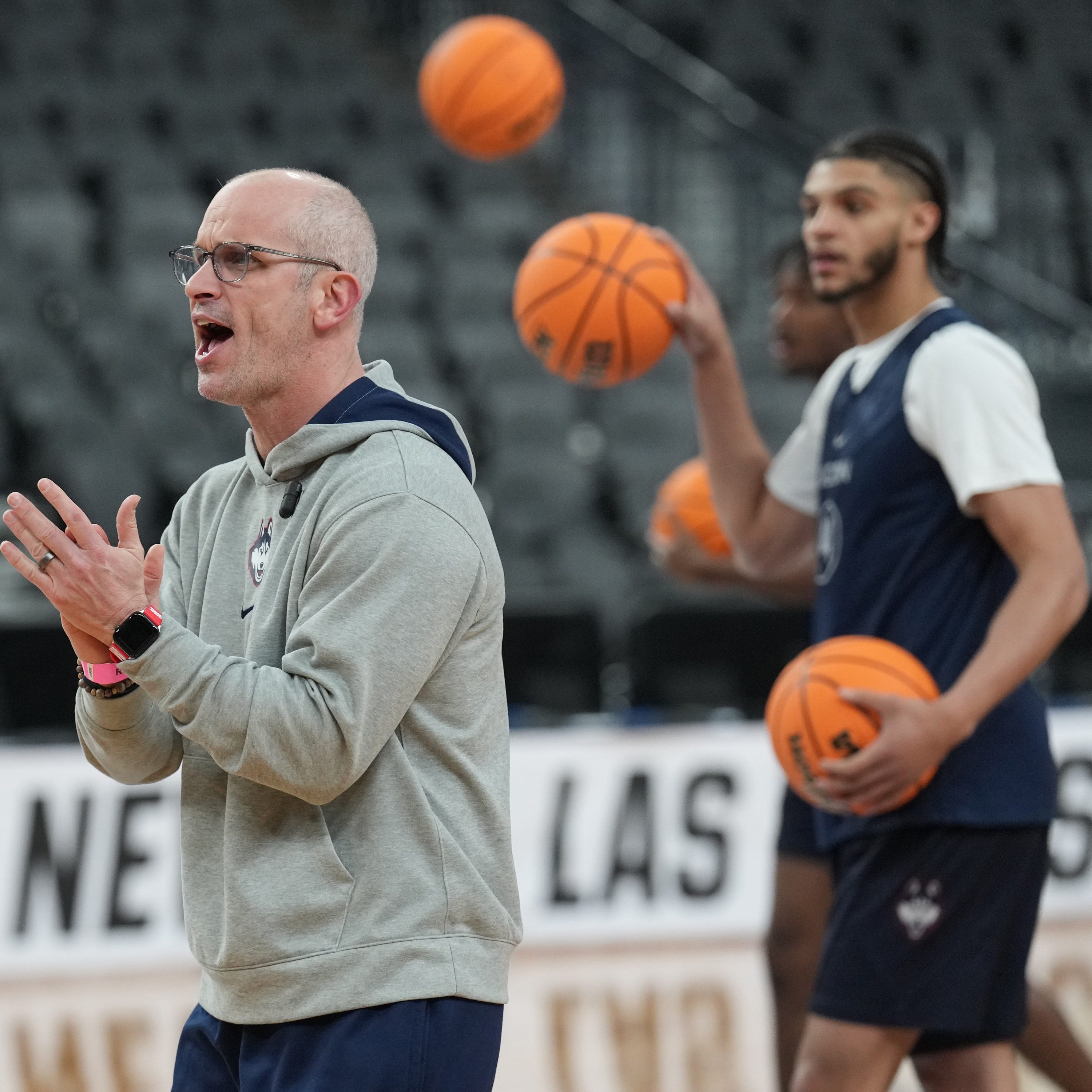 UConn coach Dan Hurley watches the Huskies practice at T-Mobile Arena in Las Vegas.