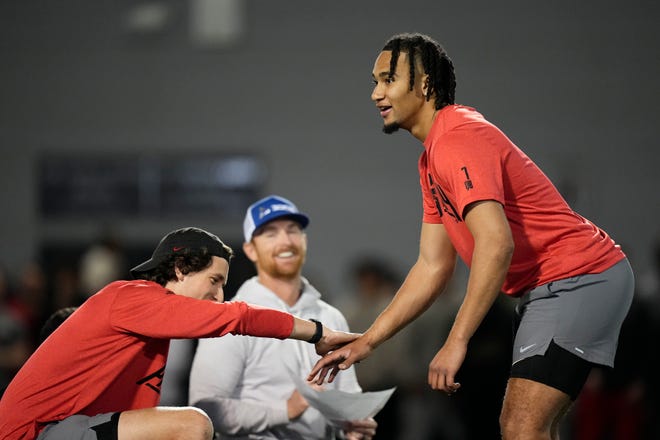 Ohio State Buckeyes quarterback C.J. Stroud works out for NFL scouts during Ohio State football’s pro day at the Woody Hayes Athletic Center in Columbus on March 22, 2023. 